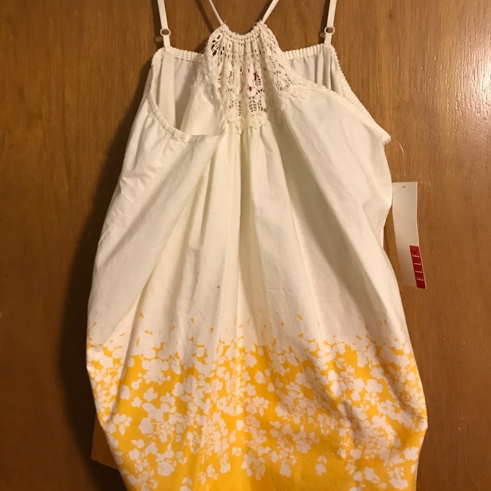 Thin strapped tank top.